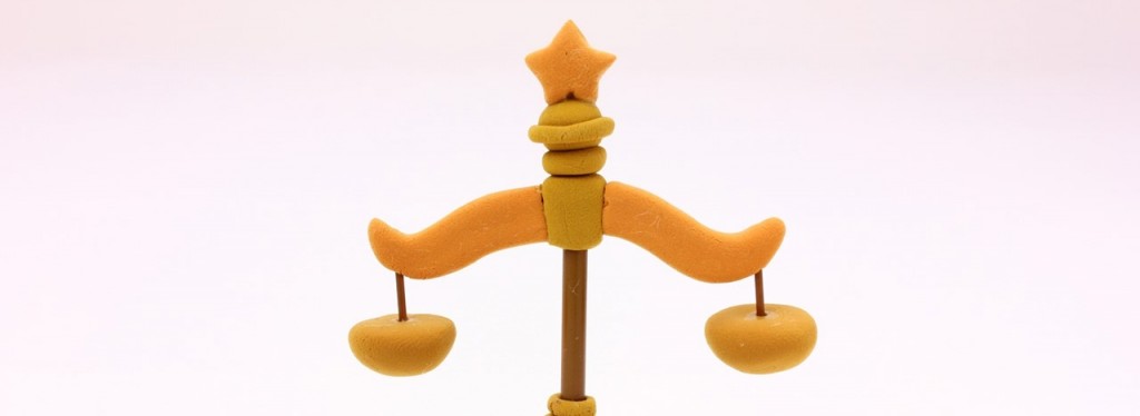 Figurine on balance